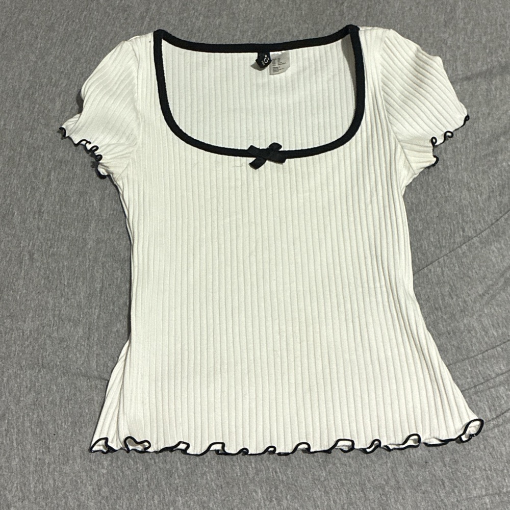 Divided White Ribbed Blouse with Black Accents